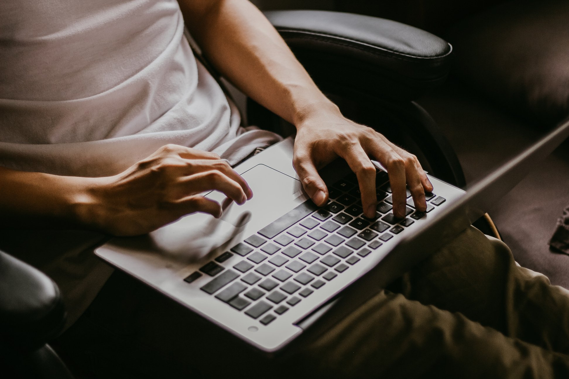 Student Using Laptop Computer for Online Class